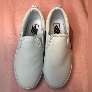 Brand new white slip on vans